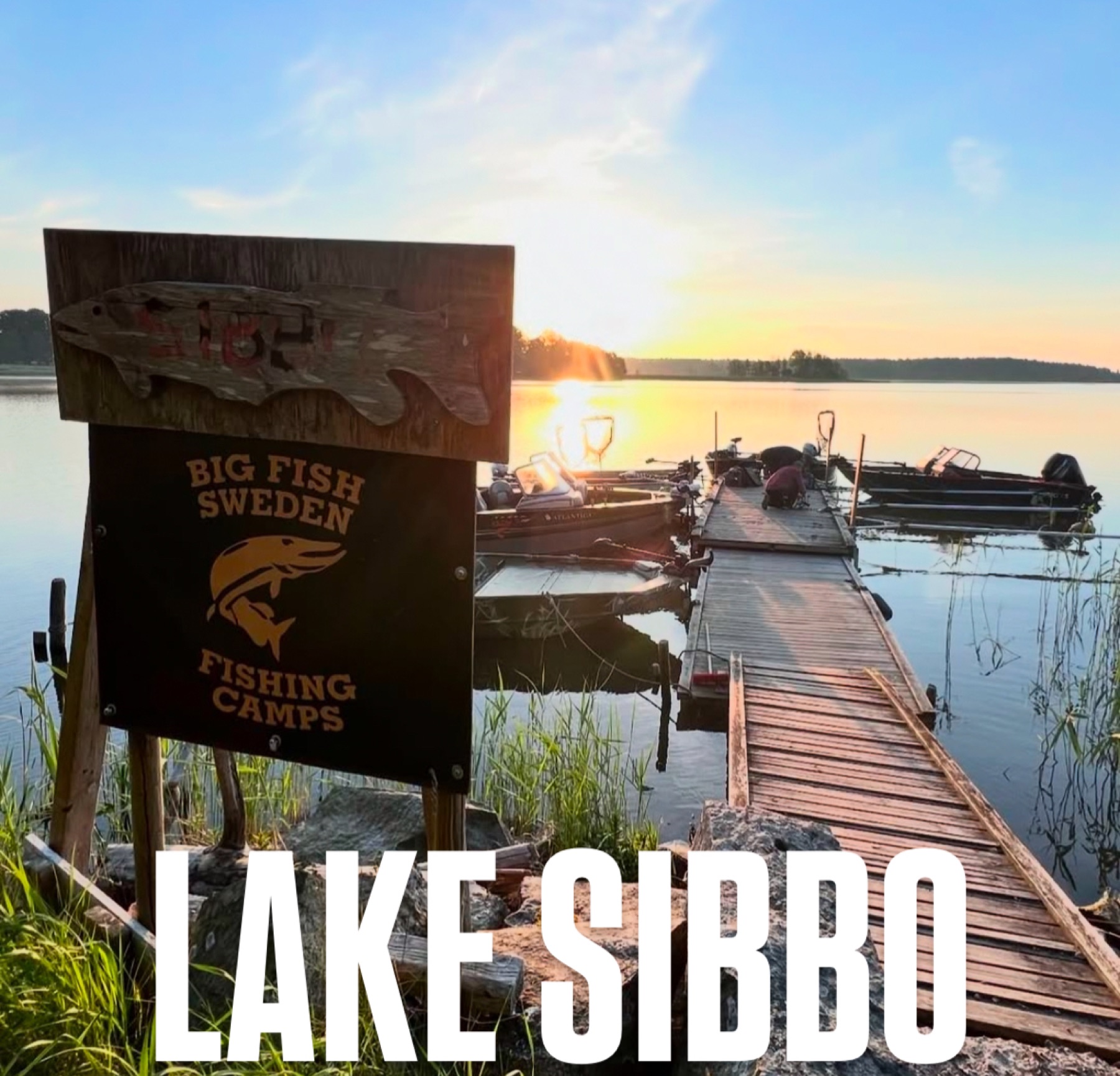 The private Lake Sibbo boat dock at sunset