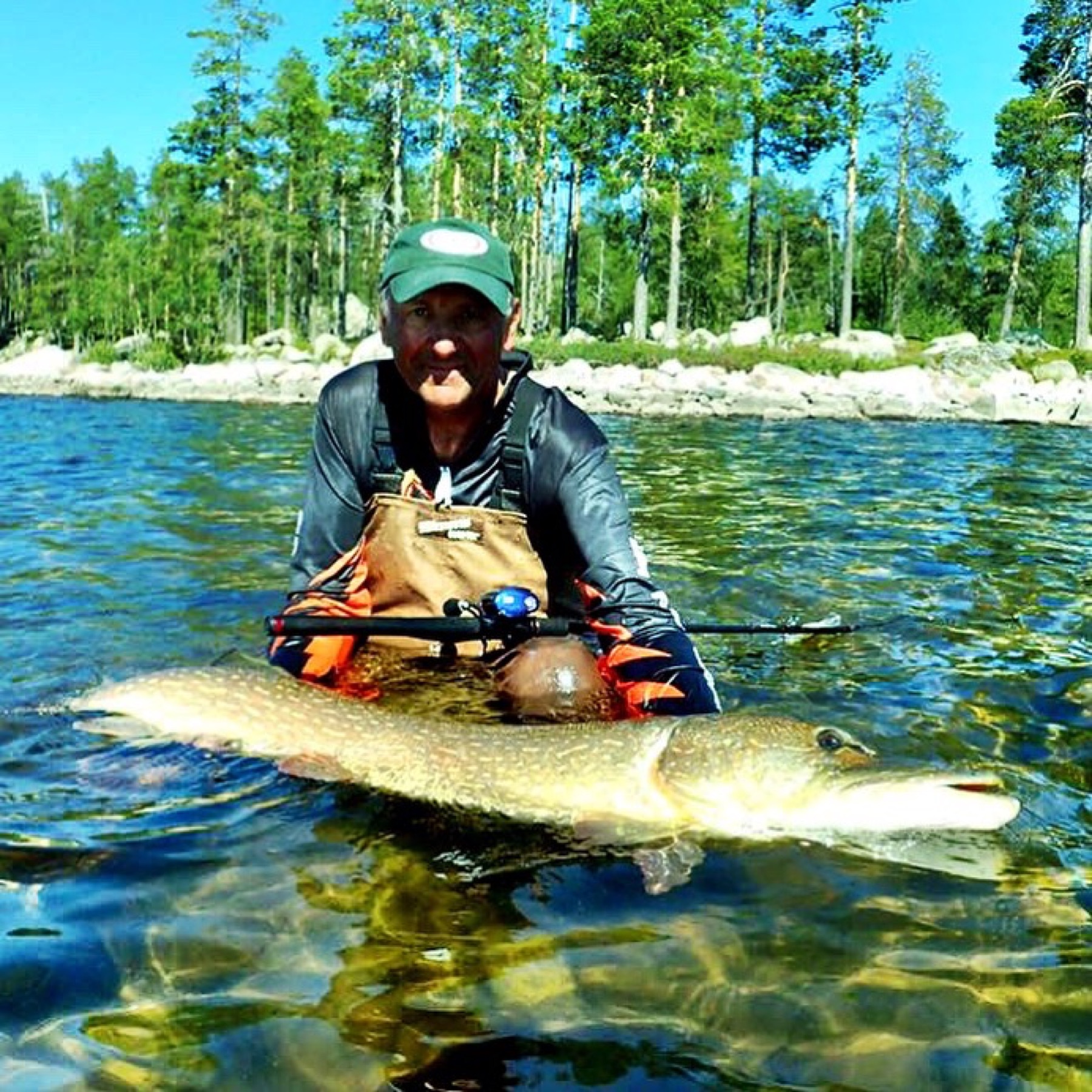 Angler fishing from a float tube in Lapland